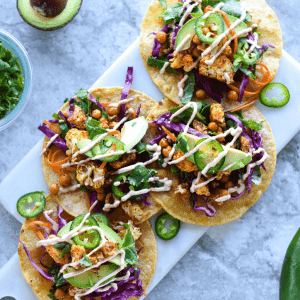 Change taco night up with these colorful cauliflower and veggie tacos.