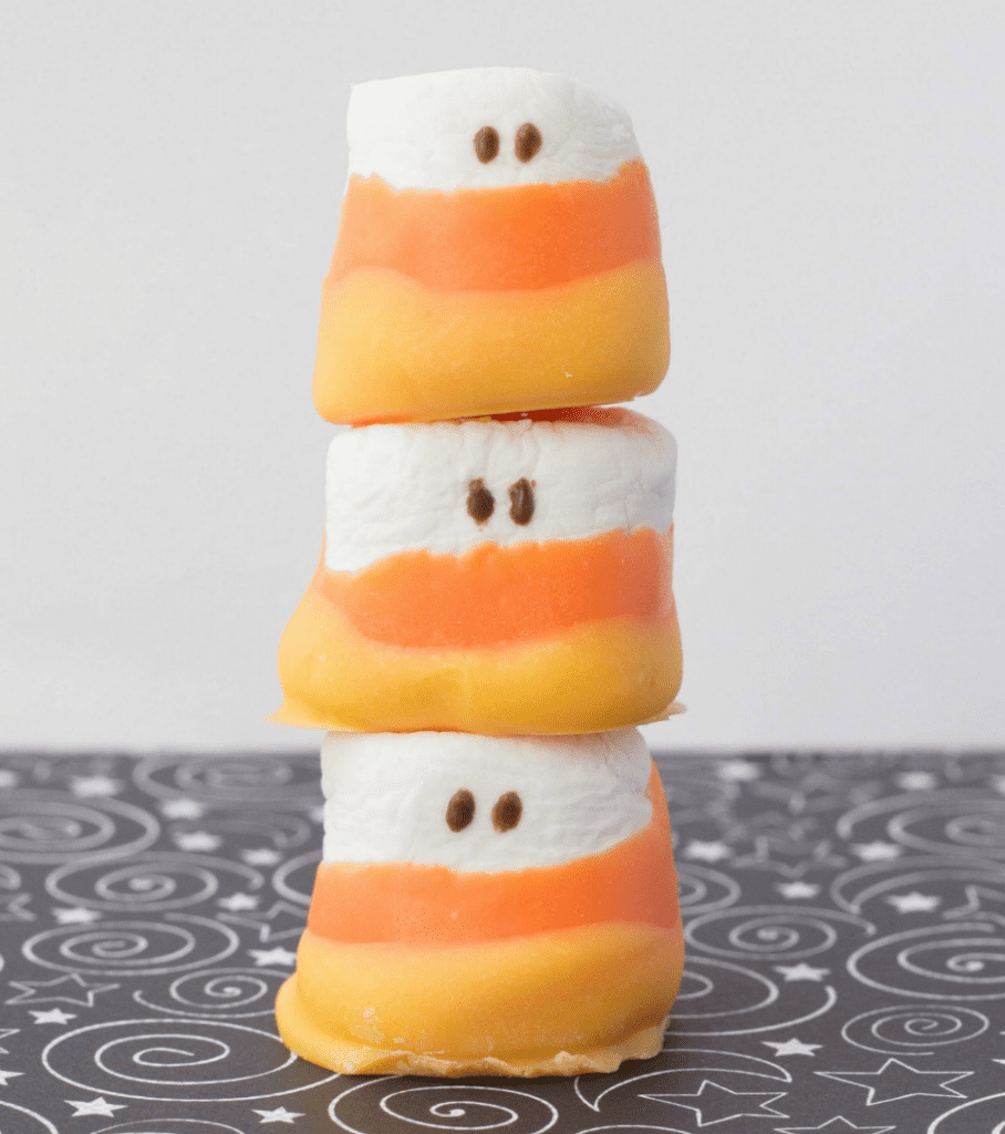 white marshmallow layered with orange and yellow chcolate