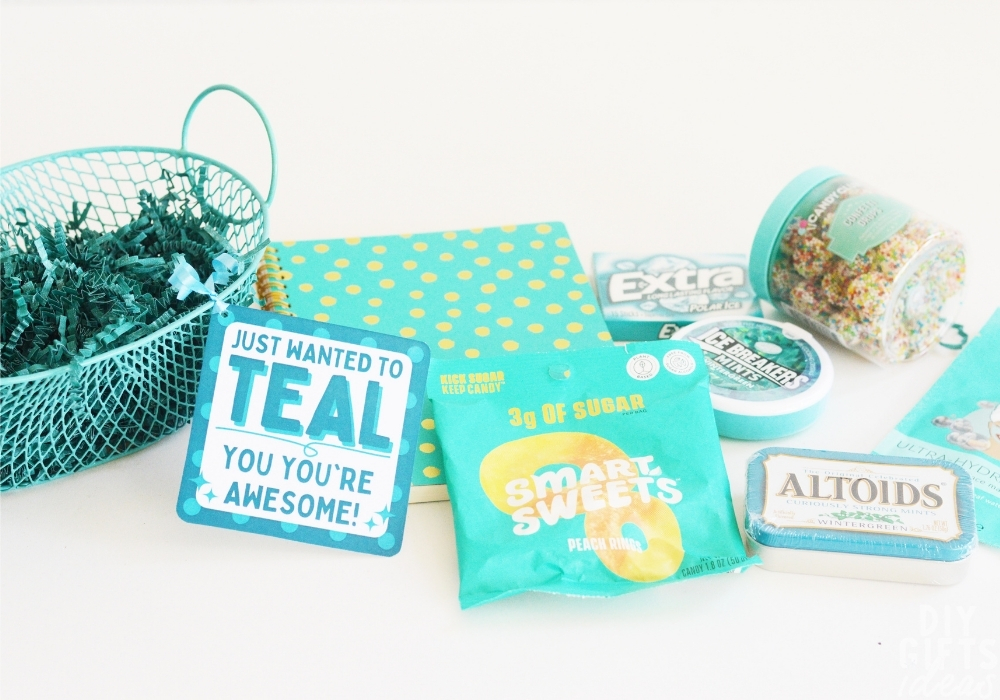 Overhead view of the supplies for the DIY Teal Gift Basket.