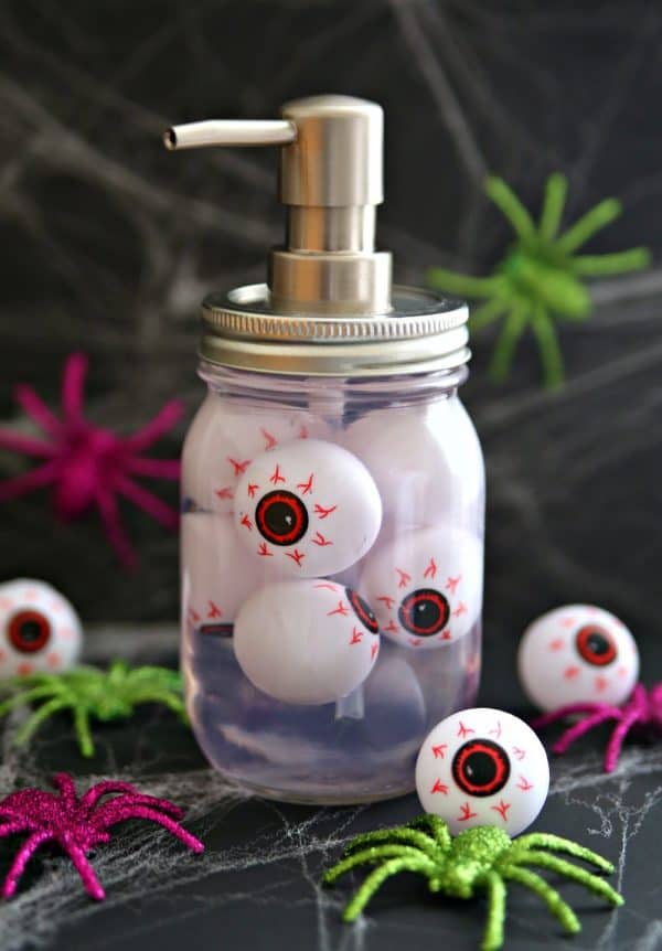 soap container with clear soap and fake eyeballs inside the soap