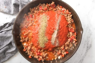 Tomato sauce and seasonings in a skillet
