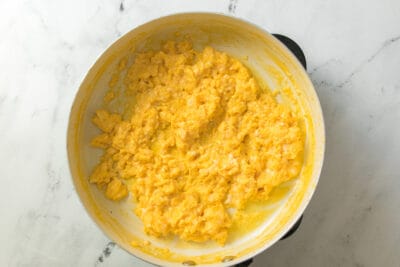 Soft scrambled eggs in a pan