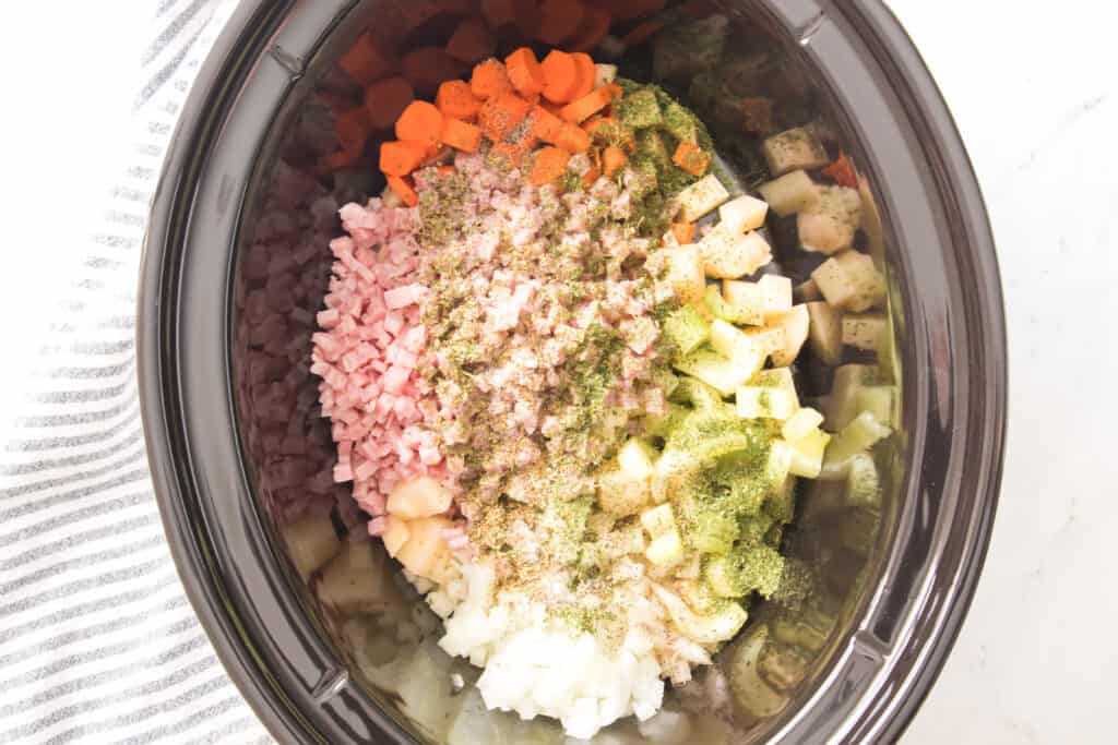 vegetables and diced ham in slow cooker