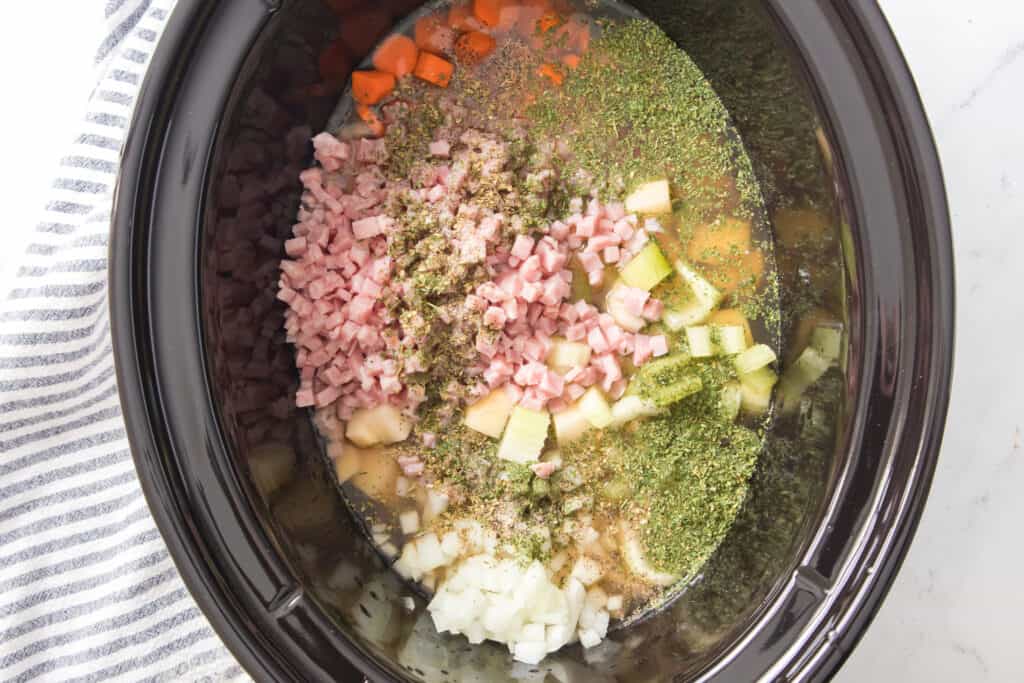 ham, diced vegetables and chicken broth in slow cooker