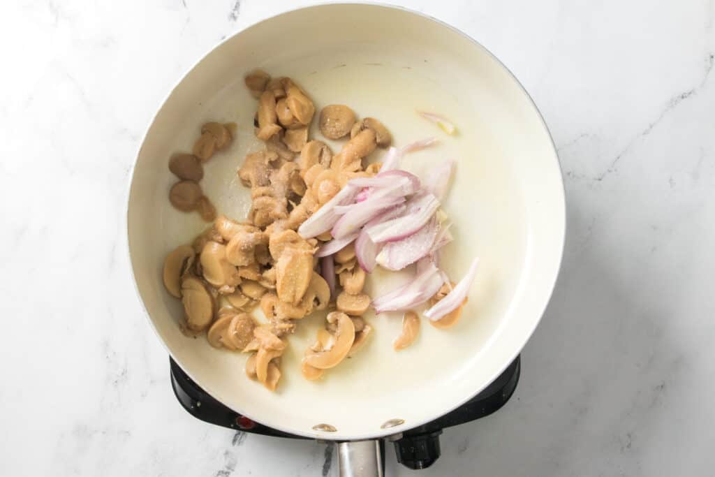 melted butter, button mushrooms and shallots in skillet