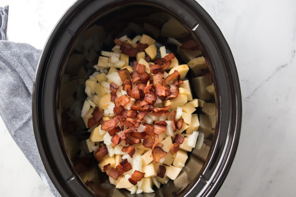 potatoes, onions and bacon added to slow cooker