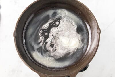 Foamy liquid in a cast iron skillet